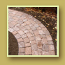 Tapered cuts take a cobblestone path smoothly around a corner
